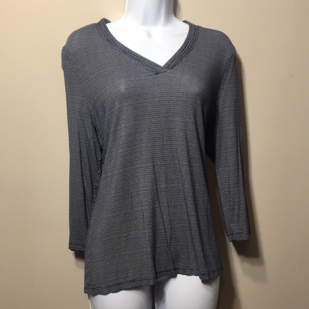 New. Never worn. Navy and white designed top.
